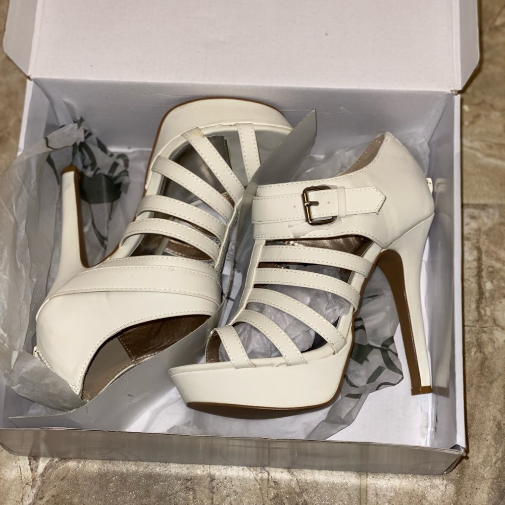 Off white heels by shi Journeys